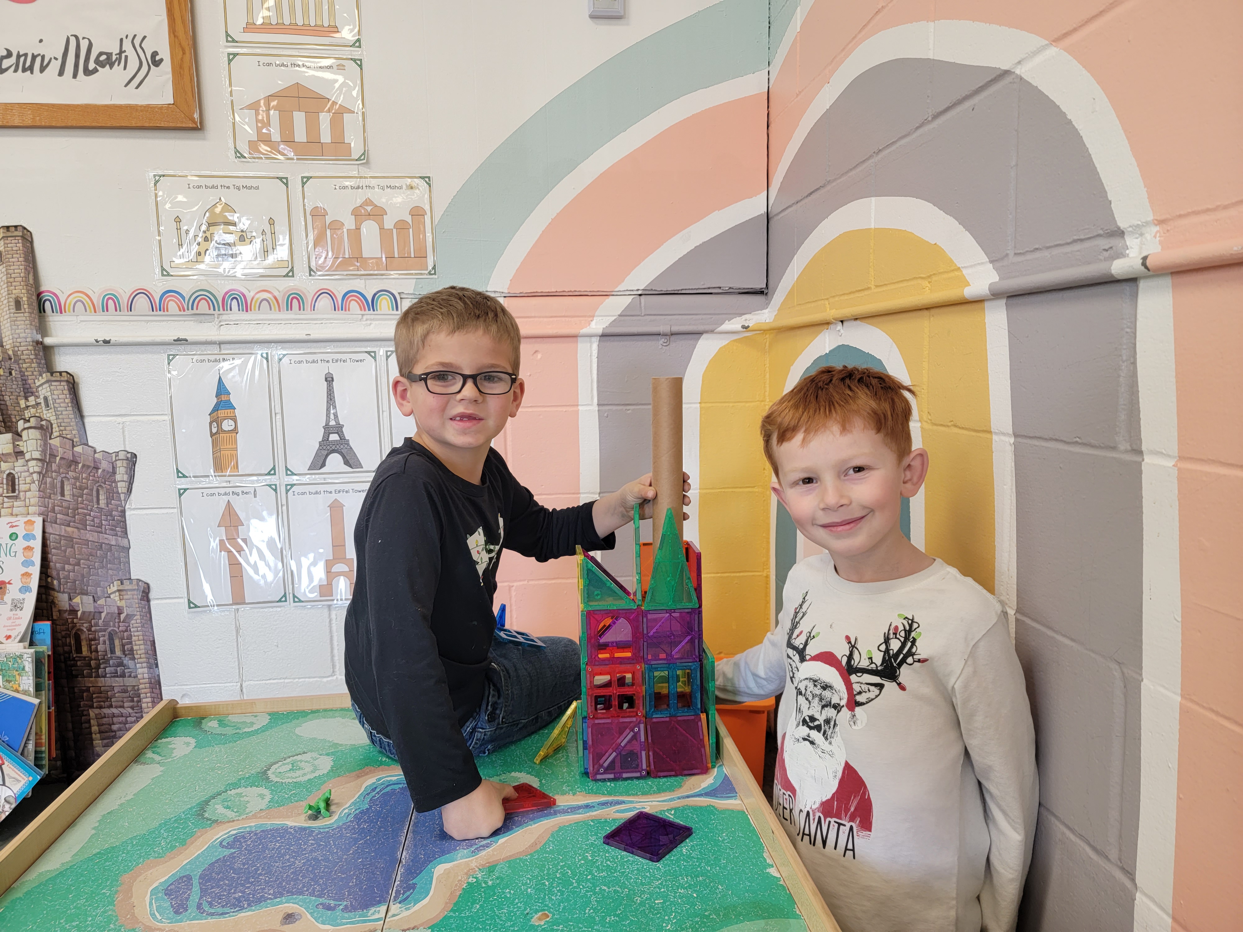 Two smiling girls at school